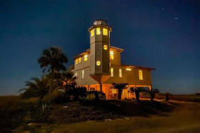 Lighthouse By The Sea